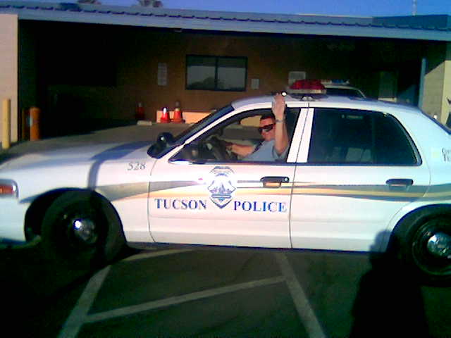 Mike in Police Car.jpg